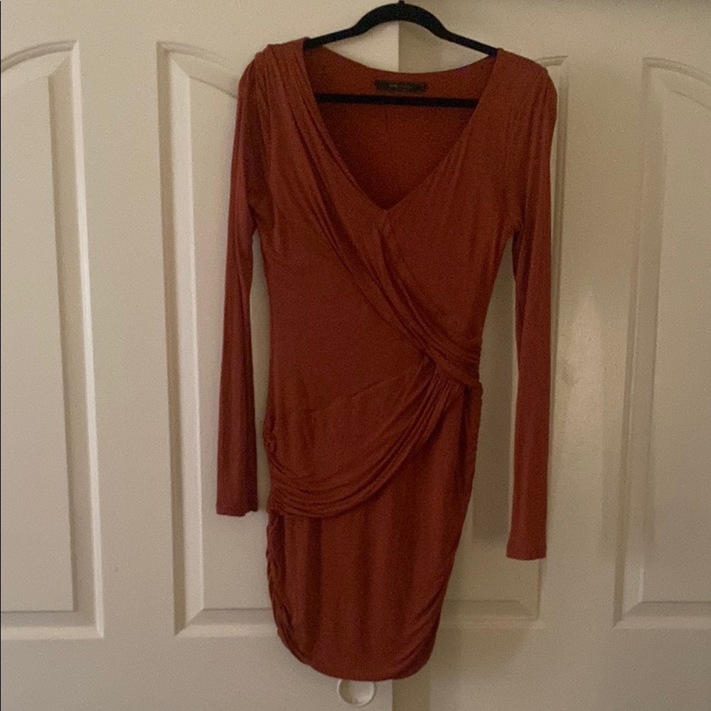 BCBGMaxazria Elegant Rust Long Sleeve Dress. with detail as shown in the photo’’